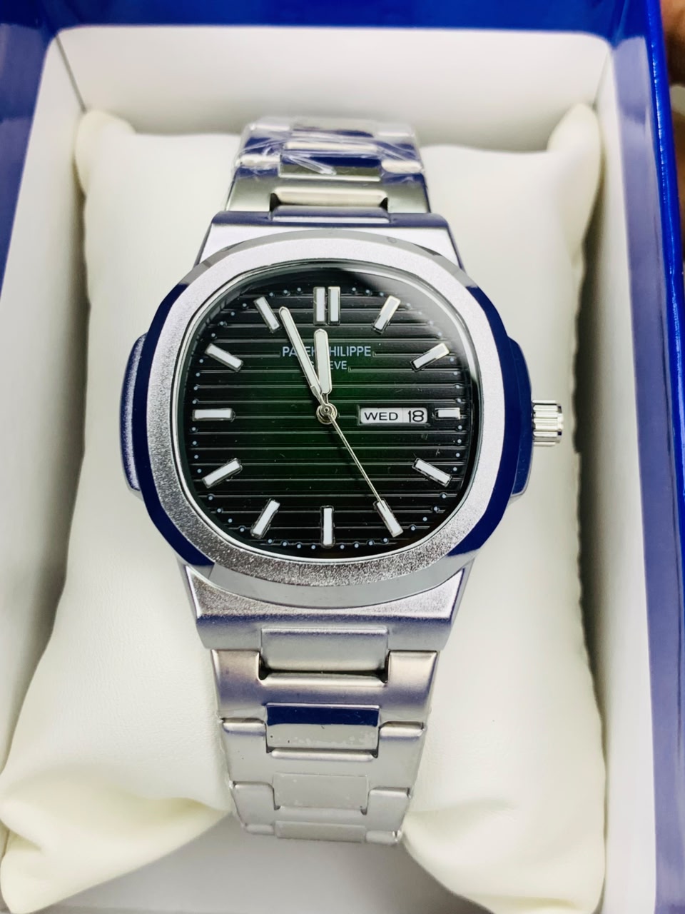 Patek Philippe Nautilus -- DAY/DATE Just